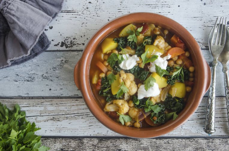 Tagine with potato, carrot, and garnish.