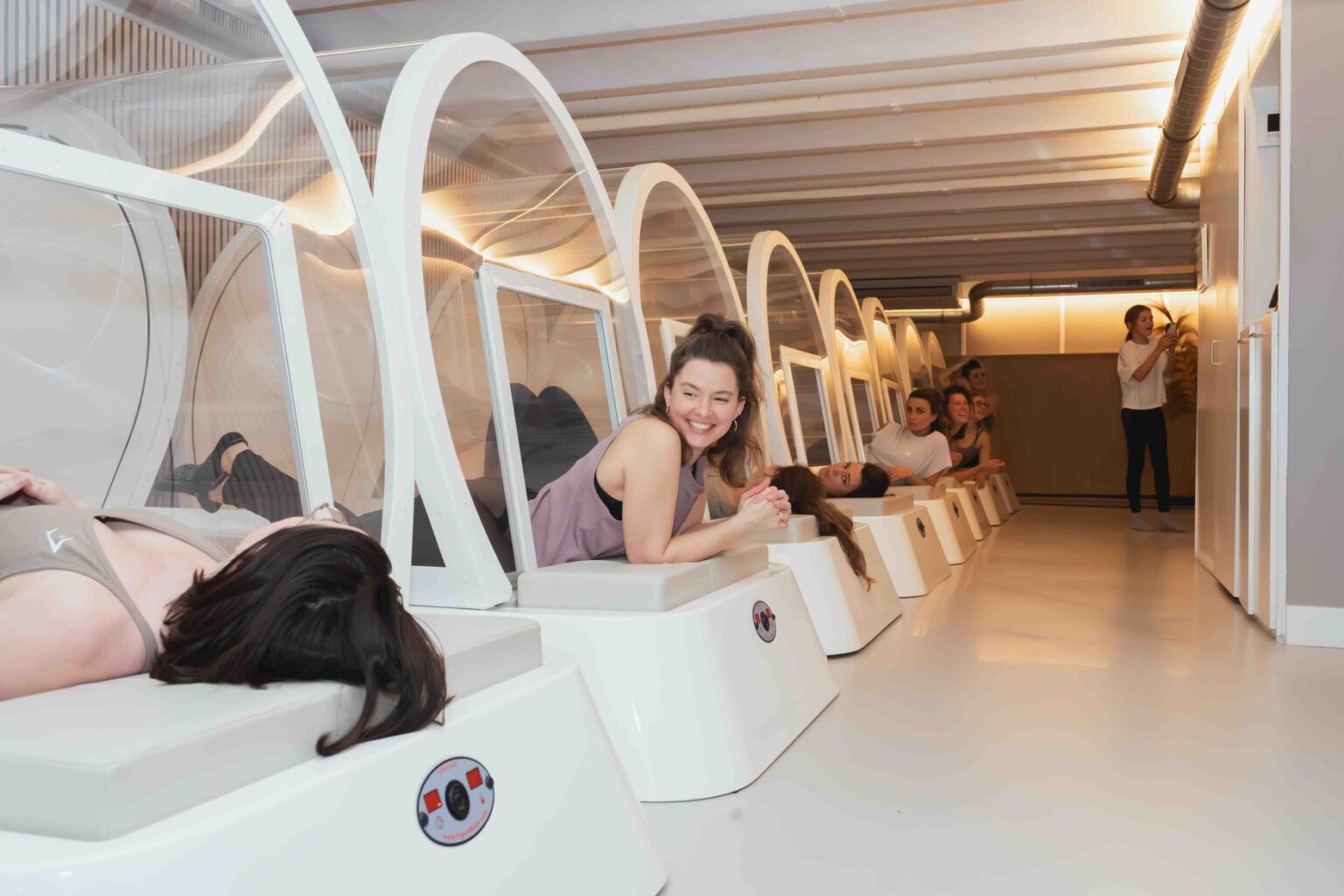 Women exercising in the heated cabins at bbb health boutique Amsterdam Amstel